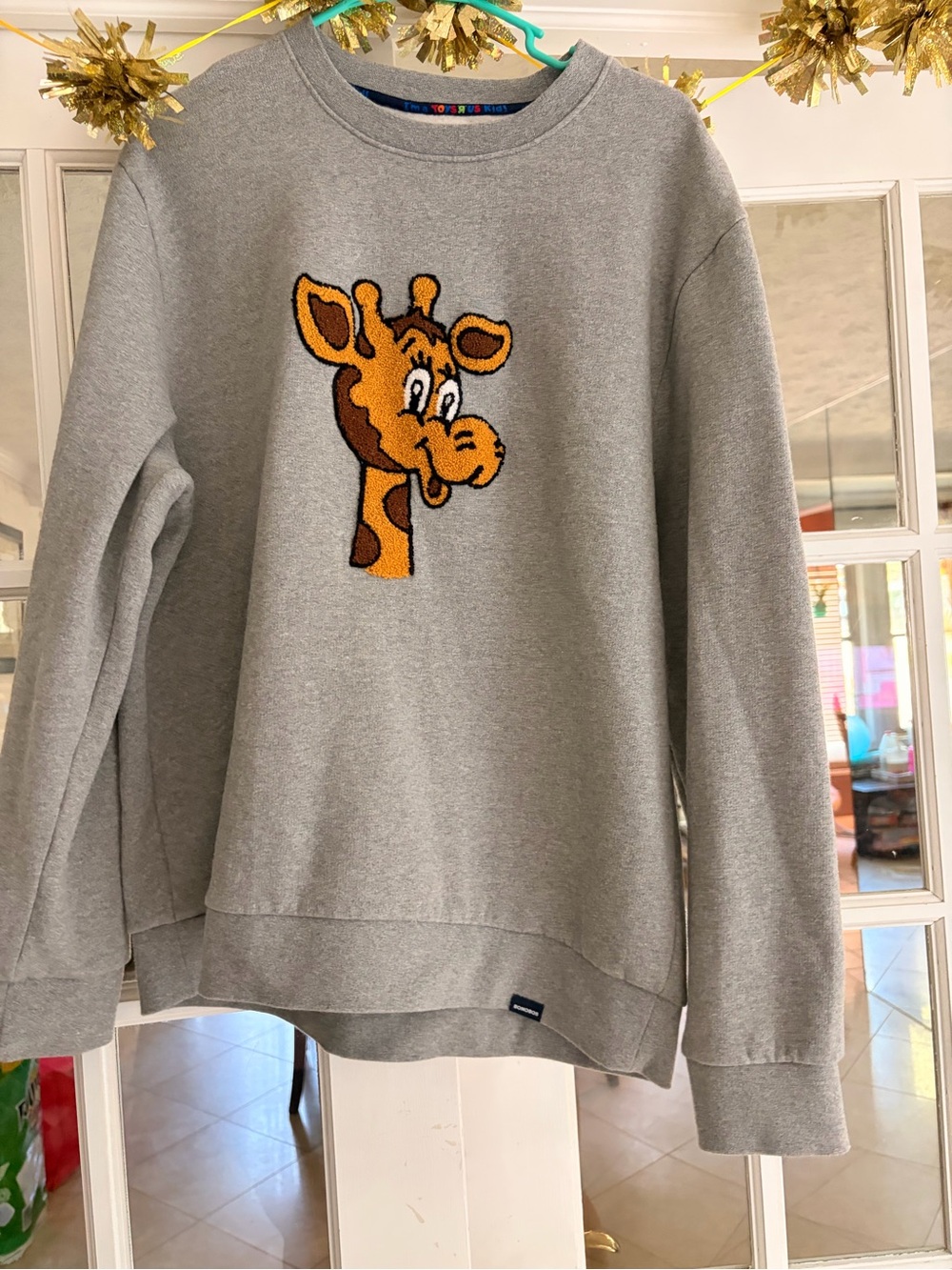 Bonobos Gray Crewneck Sweater with Orange & Brown ToysRUs Geoffrey Giraffe Patch